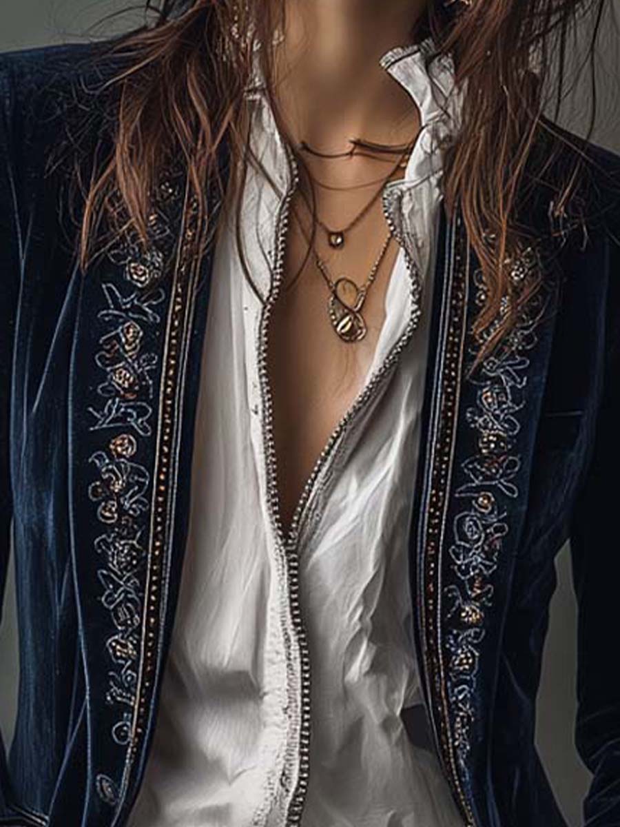 Chaqueta larga bordada en azul marino